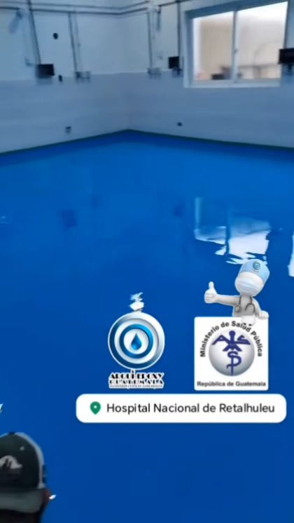 Poster de piso epóxico azul brillante en un área hospitalaria